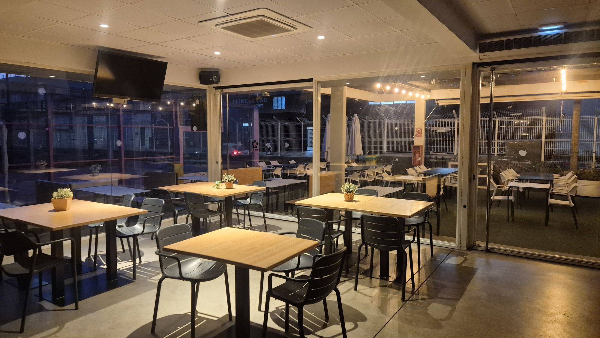 Sport-Bar interior with tables and screens